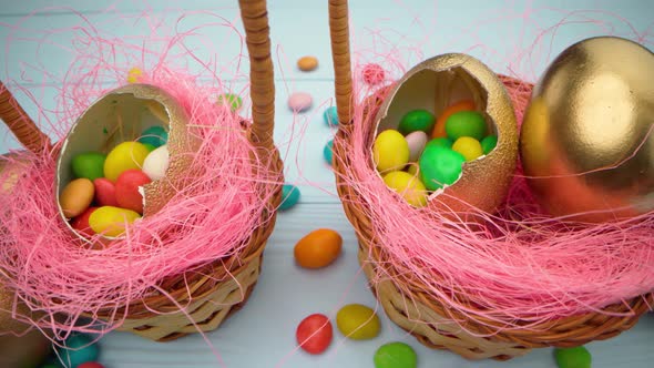 Easter Egg with Colorful Candies in a Basket Close Up