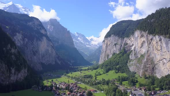 Aerial travel drone view of the Lauterbrunnen Valley and Staubbach Falls, Switzerland. alt