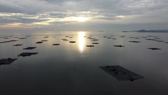 Aerial view fish farm at sea alt