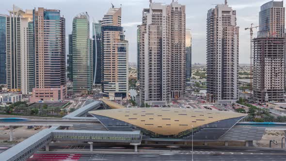 Aerial Top View to Sheikh Zayed Road Near Dubai Marina and JLT Day to Night Timelapse Dubai alt