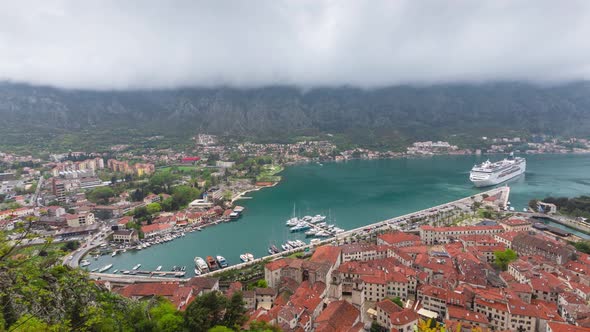 Kotor bay with cruise ship sailing from the pier, Montenegro
