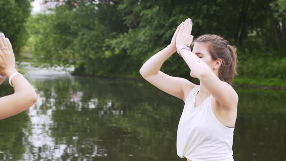 Portrait Lady Do Yoga Exercises Sitting on Wooden Pier