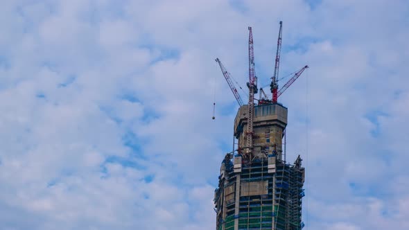 Timelapse of Highrise Construction Site at Cloudy Sky at Day