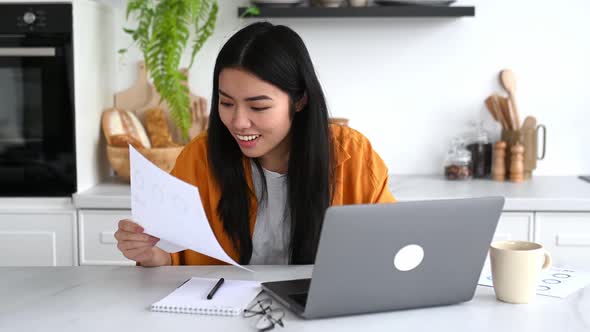 Amazed Asian Girl in Stylish Casual Clothes Freelancer IT Specialist Sitting at Table with Laptop in alt