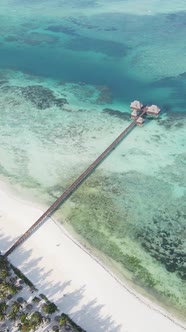 Vertical Video House on Stilts in the Ocean on the Coast of Zanzibar Tanzania alt