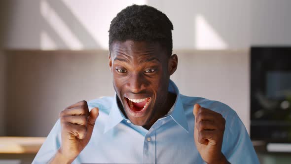 Young student who received good news on the internet rejoices at the victory alt