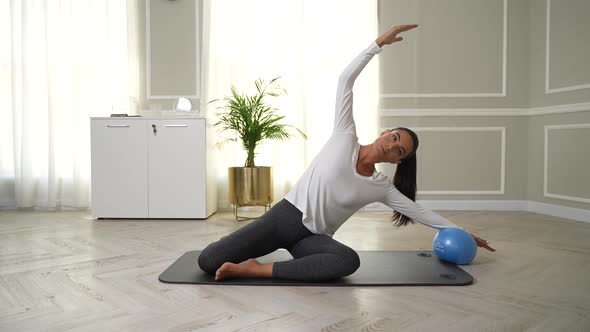 Woman Doing Workout with Ball