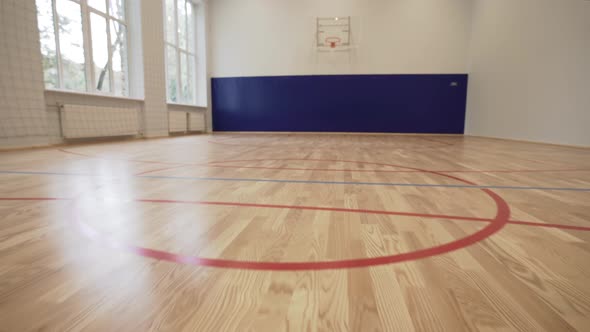 Empty School Basketball Hall with Big Windows