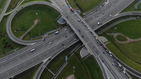 Autos Drive Along Highway Multilevel Traffic Intersection alt