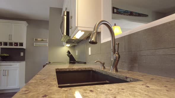 real estate reverse slider of quartz counter top high end home alt