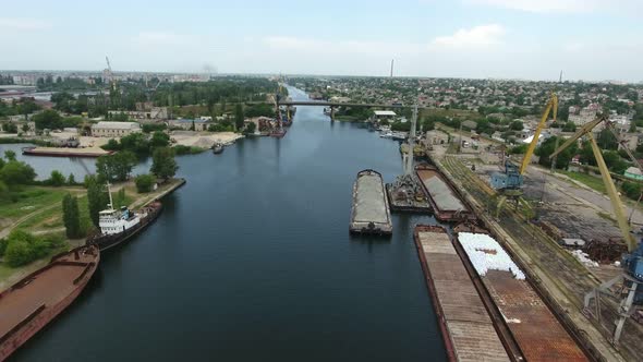 Aerial Shot of Dnipro Inflow Full of Barges and Ships on a Sunny Day in Summer
