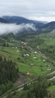 Vertical Video Village in the Carpathian Mountains in Autumn alt