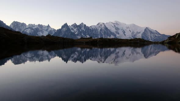 Colourful Sunrise on Chesery Lake in France Alps