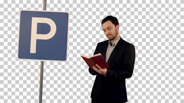 Man reading a book with parking sign, Alpha Channel