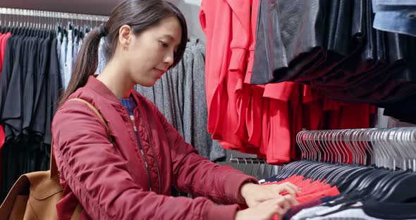 Woman shopping in boutique alt