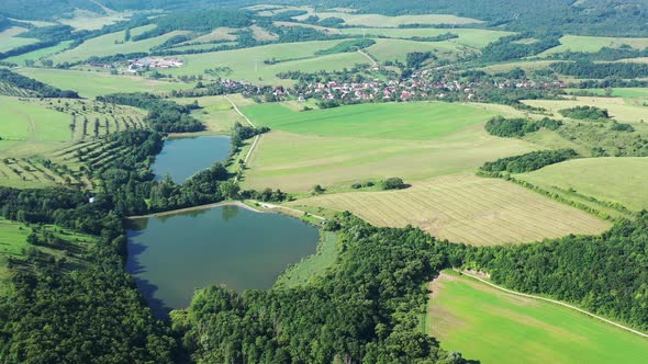 Aerial view of Hrusovske ponds near the village of Jablonov nad Turnou in Slovakia alt