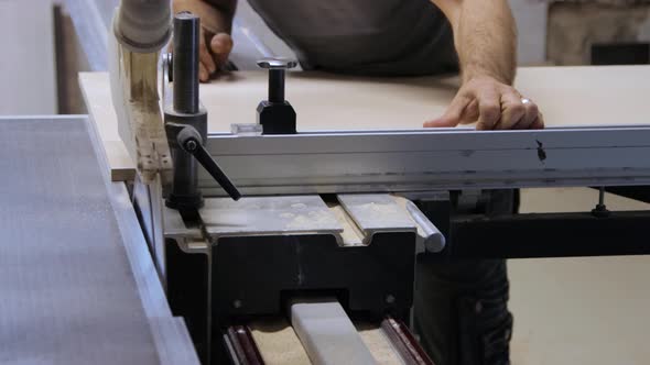 Cutting process on circular saw in closeup