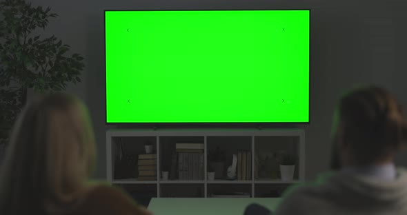 Couple Watching Green Screen TV alt