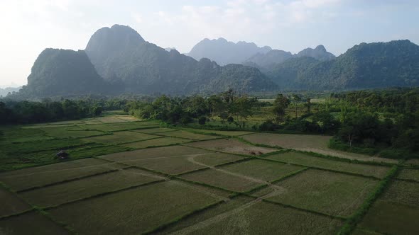 Natural landscapes around the city of Vang Vieng in Laos seen from the sky alt
