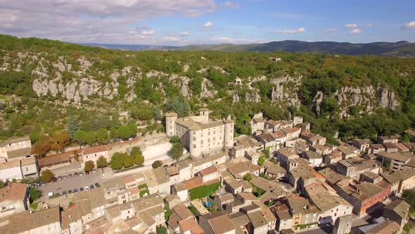 Aerial travel drone view of Balazuc, Southern France. alt