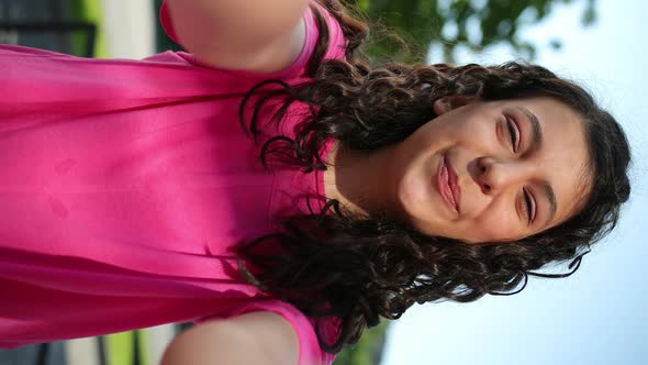 Vertical Portrait Young Girl Model Appearance Talking on the Telephone alt