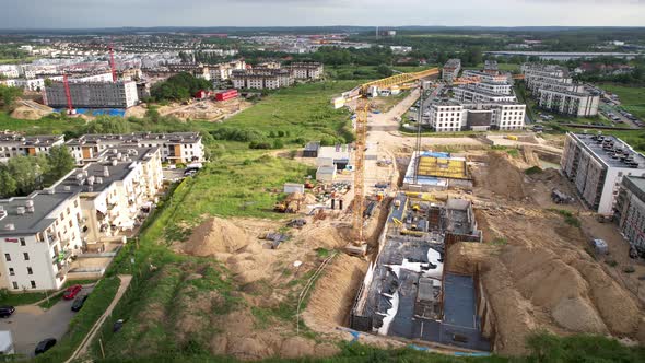 Construction site of apartment building in Gdansk, Poland, drone view from above alt