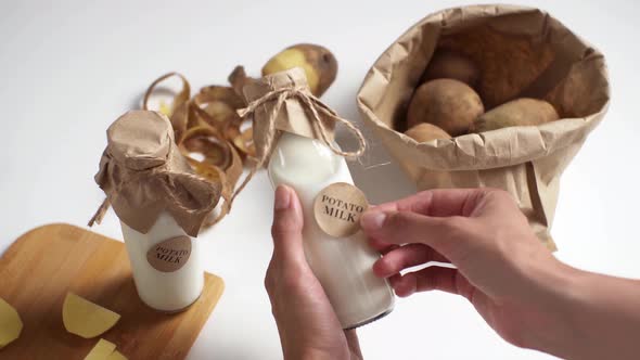 Production Of Vegetable Milk Food For Vegetarians, Milk Without Lactose Is Bottled In Glass Bottles alt