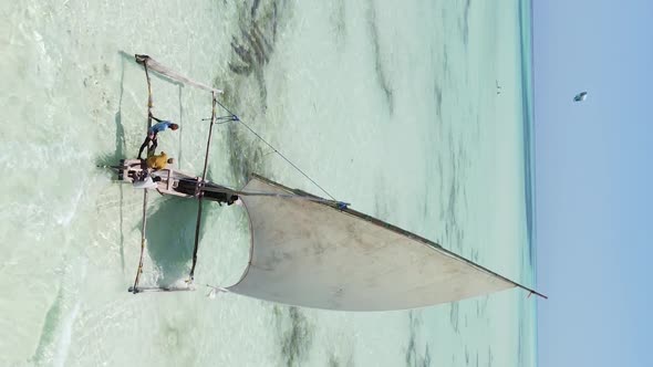 Tanzania Vertical Video  Boat Boats in the Ocean Near the Coast of Zanzibar Aerial View alt