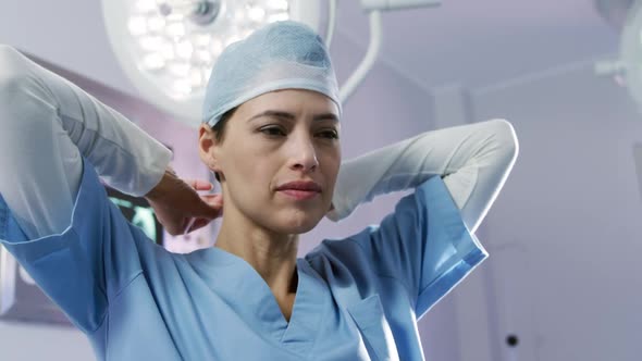 Medical professional working at a hospital alt