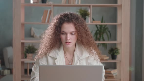 Young Girl is Studying on an Online Webinar Course Speaks on a Webcam, Stock Footage