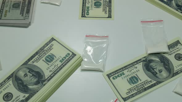 Dollars And Cocaine On The Table alt