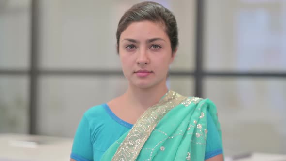 Portrait of Serious Indian Woman Looking at the Camera alt