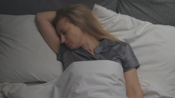 Woman Suffering From Sleeping Disorder
