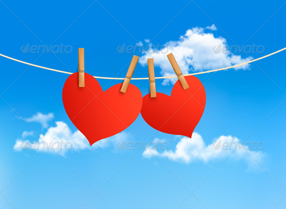Two Hearts Hanging on a Rope in Front of a Sky - Valentines Seasons/Holidays