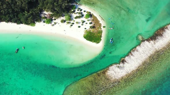 Small boats surrounding sandy islet on the north coast of Thailand. Aerial. Malibu Beach, Koh Phanga alt