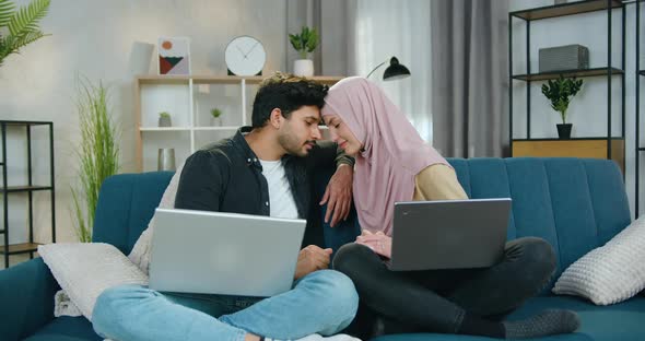 Young Couple in Love Bowing their Heads to Each other and then Looking into camera alt
