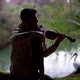 Silhouette of a Street Musician a Man Playing a Classical Stringed Instrument Violin in Nature - VideoHive Item for Sale