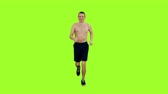 Handsome Man With Naked Torso Jogging