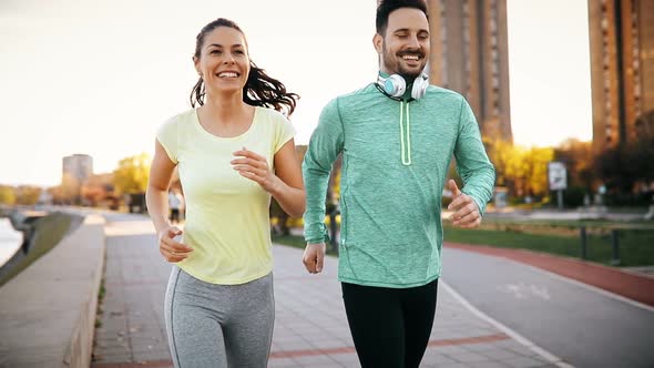 Athletic Couple Jogging Together