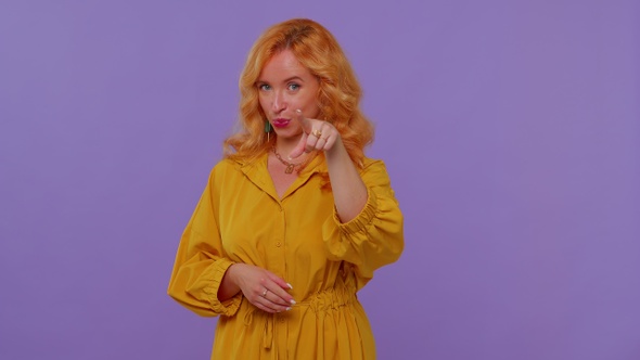 Pretty Adult Girl Pointing to Camera and Looking with Playful Happy Expression Making Choice alt