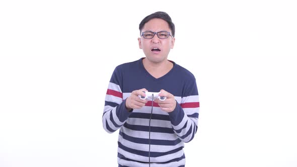 Stressed Japanese Hipster Man Playing Games and Losing alt