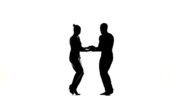 Two Latino Dancers Finishing Dancing, Silhouette, on White alt