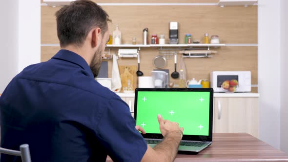 Man Typing on Computer Keyboard at the Table alt