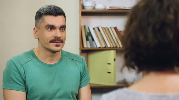 Annoyed Man Shouting at His Colleague Proving His Point of View Argument alt