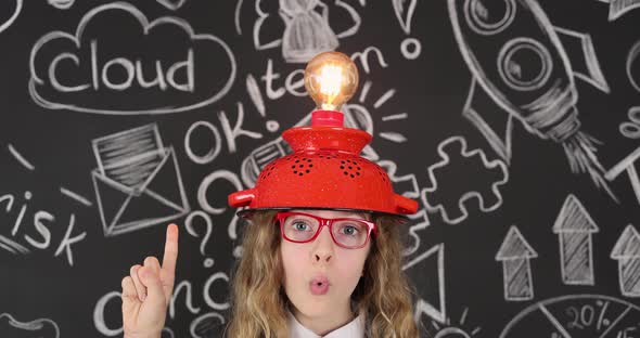 Funny girl wearing handmade helmet with lightbulb