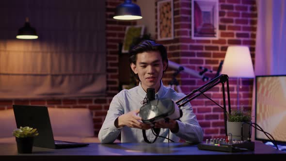 Lifestyle Vlogger Reviewing Vr Headset Product on Podcast Episode alt