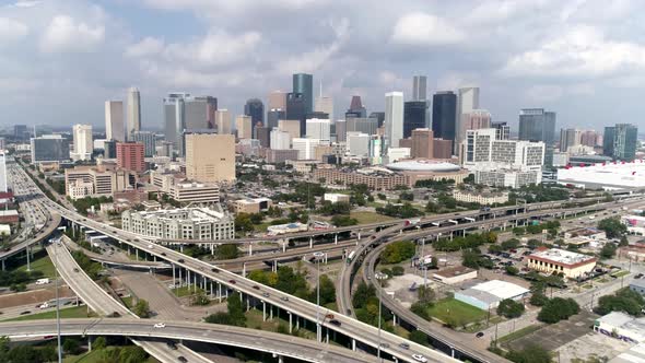 This video is of an aerial view of downtown Houston skyline on a cloudy day. This video was filmed i alt