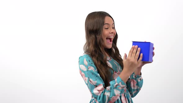 Cheerful Teen Girl Taking Surprise Gift Box From Female Hands Isolated on White Birthday alt