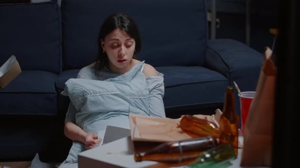 Depressed Woman Reading Eviction Notice Screaming Crying Suffering a Shock alt