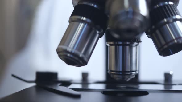 microscope close-up. automated research. search for germs and viruses alt